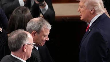 On February 24, 2026, President Donald Trump greeted Justice John Roberts at Trump’s State of the Union address in Washington, D.C.