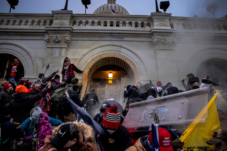 Trump supporters clash with police and security forces as people try to storm the U.S. Capitol on January 6, 2021 in Washington, DC.
