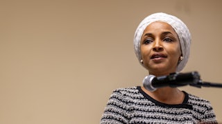 Representative Ilhan Omar speaks at the town hall where she was attacked.