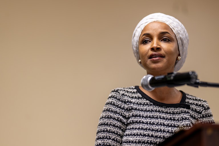 Representative Ilhan Omar speaks at the town hall where she was attacked.