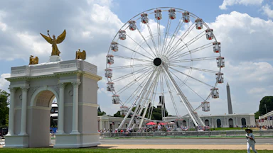 Great American State Fair with a ferris wheel and small national arch replica
