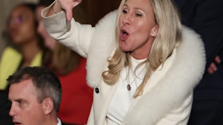 Marjorie Taylor Greene gives President Biden a thumbs-down