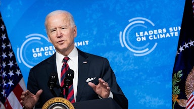President Biden speaks at a podium.