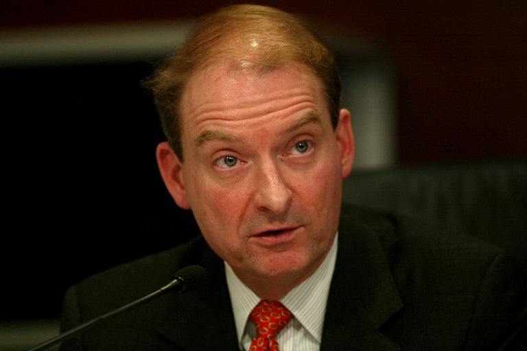 Paul Atkins speaks and raises his eyebrows