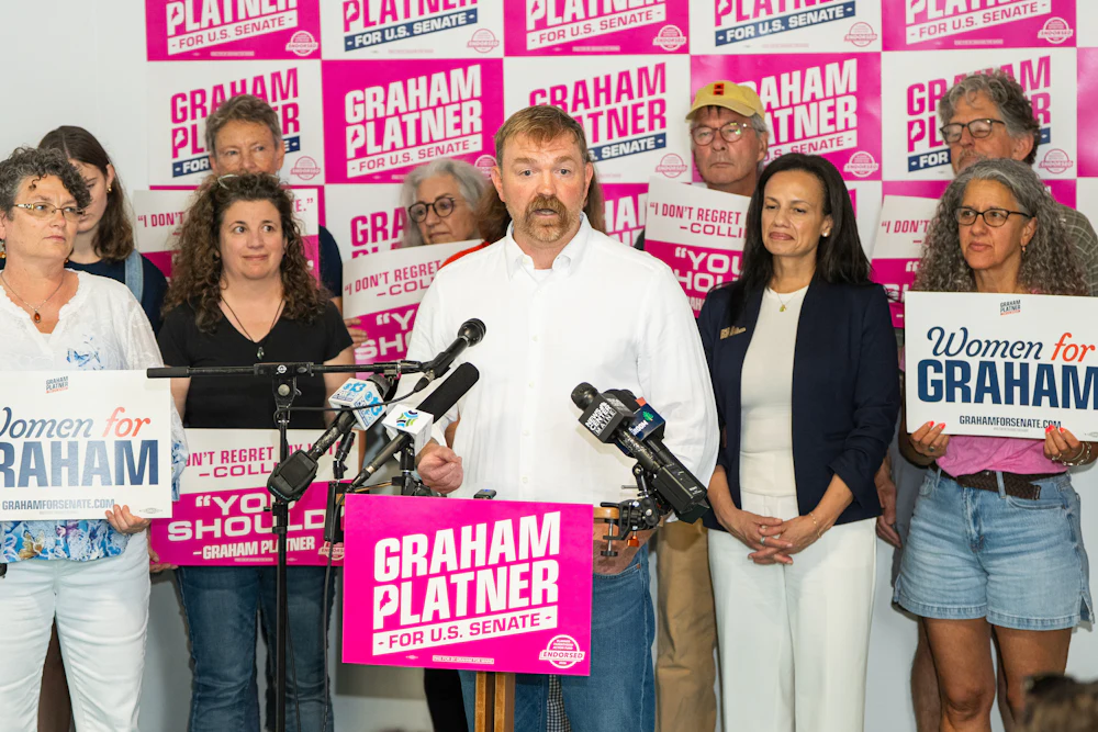 Graham Platner appearing with Planned Parenthood activists