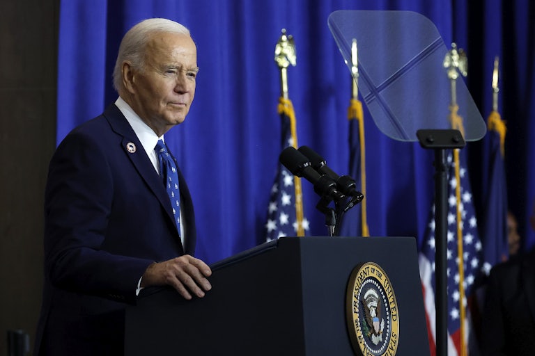 Joe Biden stands at a podium