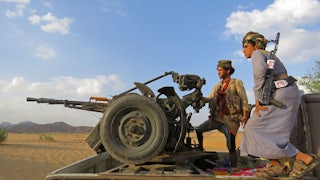 Fighters loyal to Yemen’s Saudi-backed government man a position near the al-Jawba frontline, facing Iran-backed Houthi rebels, in the country's northeastern province of Marib.