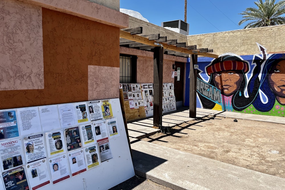Bulletin boards with notices about missing Indigenous people, at Drumbeat Indian Arts in Phoenix