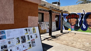 Bulletin boards with notices about missing Indigenous people, at Drumbeat Indian Arts in Phoenix