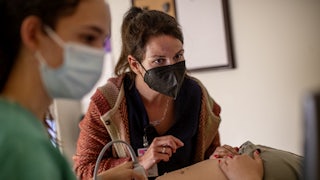 A family physician and her resident perform an ultrasound on a 25-year-old woman the day before the Supreme Court overturned Roe v. Wade at the Center for Reproductive Health clinic in Albuquerque, New Mexico.
