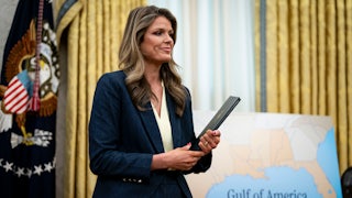 Lindsey Halligan stands near a sign reading Gulf of America.