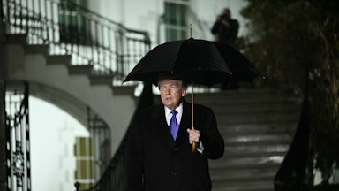 Donald Trump walks to speak to reporters as he departs from the South Lawn of the White House.