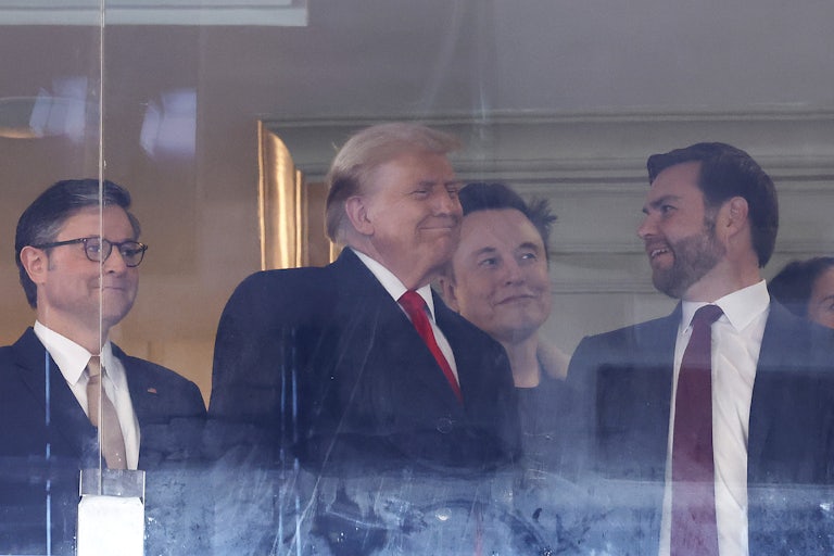 Donald Trump smiles while flanked by Mike Johnson, Elon Musk, and JD Vance