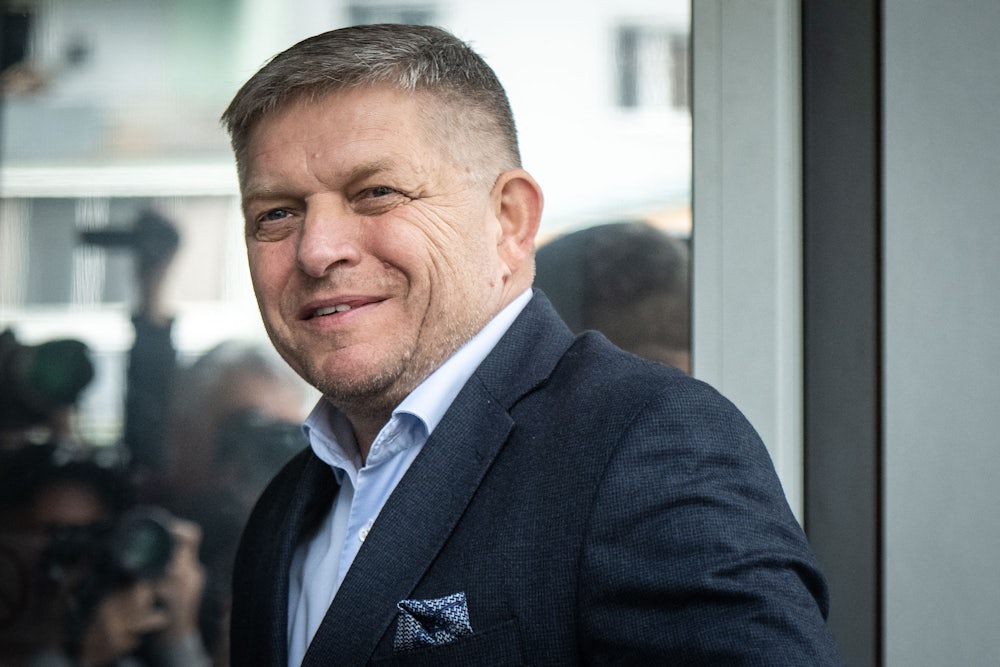 Slovak Prime Minister Robert Fico looks in the camera.