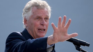 Virginia gubernatorial candidate Terry McAuliffe gestures during a campaign stop in Virginia.