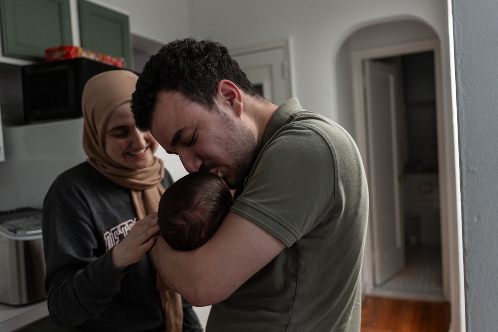 Mahmoud Khalil with his wife, Dr. Noor Abdalla, at home with their infant son after over 100 days apart, in New York, June 21, 2025.
