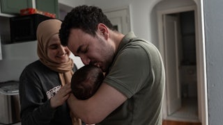 Mahmoud Khalil with his wife, Dr. Noor Abdalla, at home with their infant son after over 100 days apart, in New York, June 21, 2025.