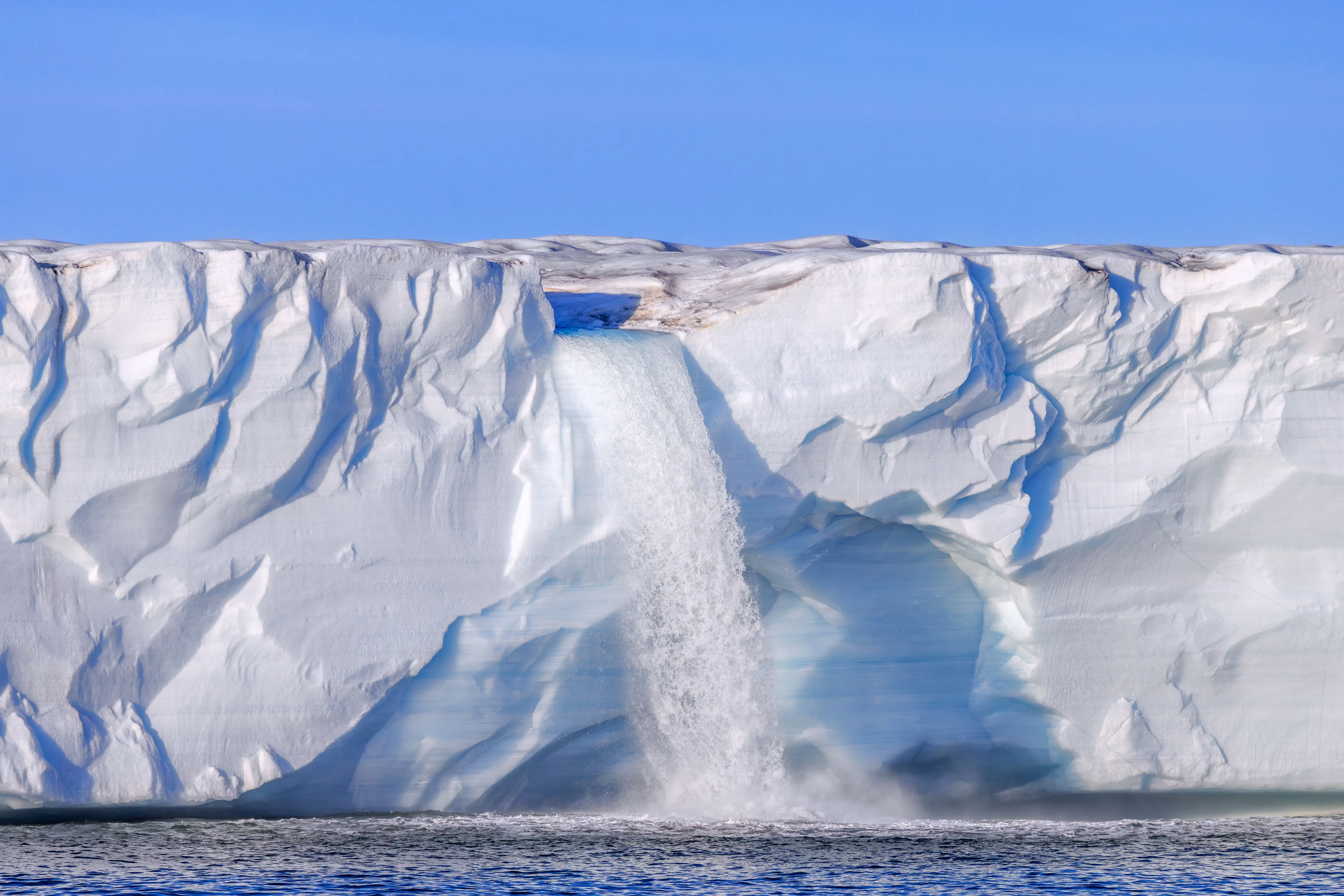 A waterfall at the Bråsvellbreen glacier in the Barents Sea, through which an important ocean current, the Amoc, passes. 