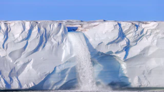 A waterfall at the Bråsvellbreen glacier in the Barents Sea, through which an important ocean current, the Amoc, passes.