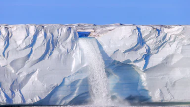 A waterfall at the Bråsvellbreen glacier in the Barents Sea, through which an important ocean current, the Amoc, passes.