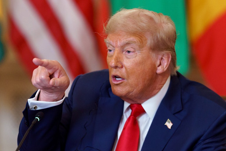 Donald Trump points while speaking during a meeting with African leaders at the White House