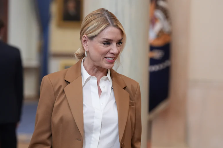 Pam Bondi smiles weirdly