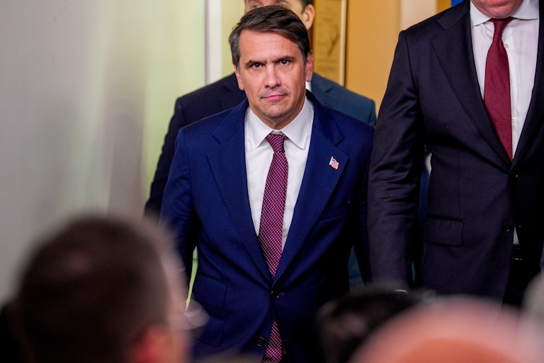 Todd Blanche looks straight ahead