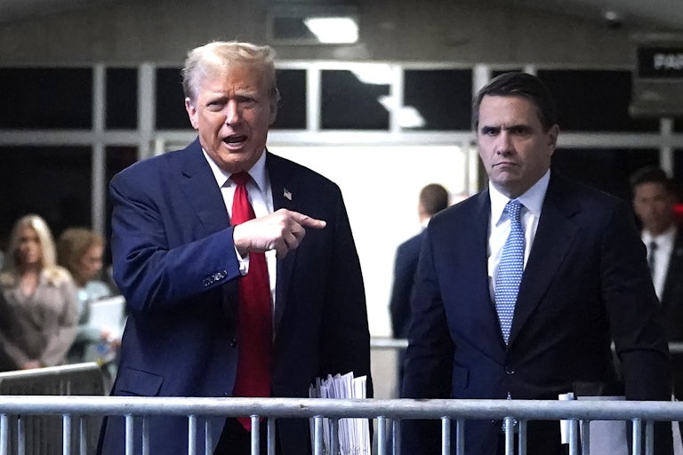 Donald Trump yells and points at Todd Blanche