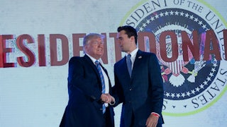 Donald Trump shakes hands with Charlie Kirk before addressing the Turning Point USAs Teen Student Action Summit.