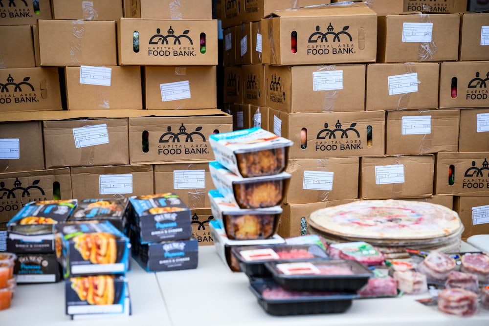 Boxes of donated food items to be distributed to furloughed federal workers at a Capital Area Food Bank distribution site in Hyattsville, Maryland, US, on Tuesday, Nov. 4, 2025.