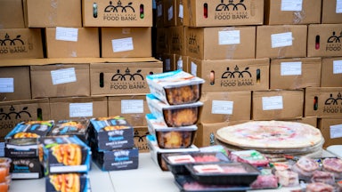Boxes of donated food items to be distributed to furloughed federal workers at a Capital Area Food Bank distribution site in Hyattsville, Maryland, US, on Tuesday, Nov. 4, 2025.