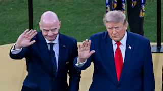 FIFA President Gianni Infantino and U.S. President Donald Trump wave after the World Cup final
