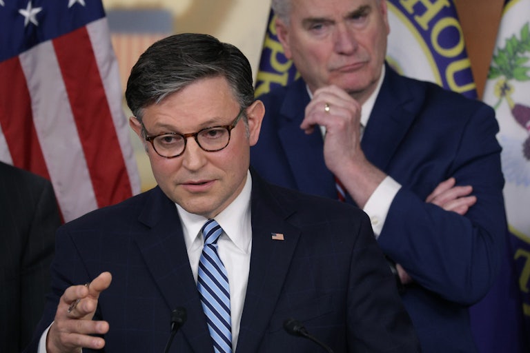 House Speaker Mike Johnson gestures while speaking during a press conference