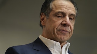A close-up of a scowling Andrew Cuomo.