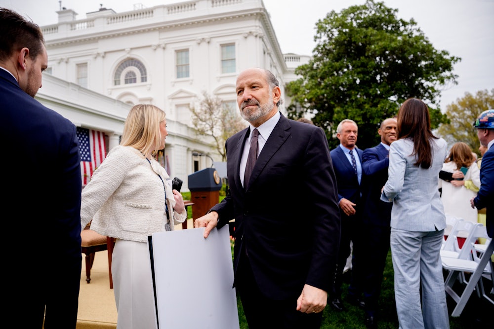 Commerce Secretary Howard Lutnick departs after U.S. President Donald Trump signs executive orders imposing tariffs on imported goods during a "Make America Wealthy Again" trade announcement.