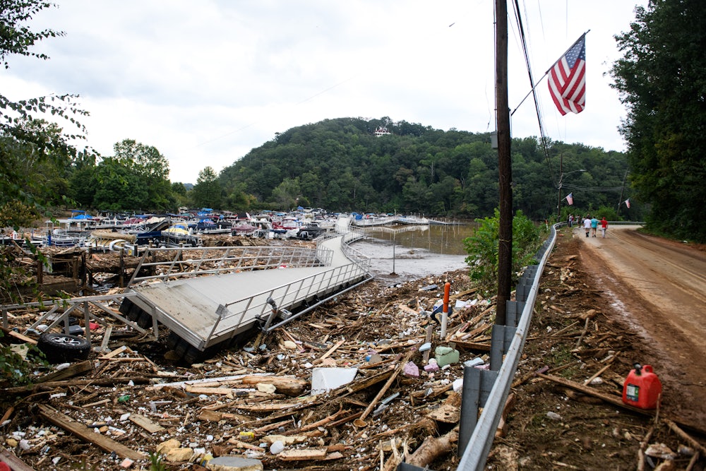 The Rocky Broad River flows into Lake Lure and overflows the town with debris from Chimney Rock, North Carolina after heavy rains from Hurricane Helene on September 28, 2024, in Lake Lure, North Carolina.