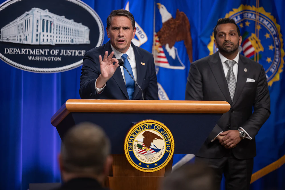 In April 2026, acting attorney general Todd Blanche gestured as he spoke at a press conference with FBI director Kash Patel about an indictment of the Southern Poverty Law Center.