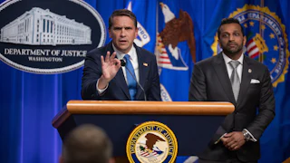 In April 2026, acting attorney general Todd Blanche gestured as he spoke at a press conference with FBI director Kash Patel about an indictment of the Southern Poverty Law Center.