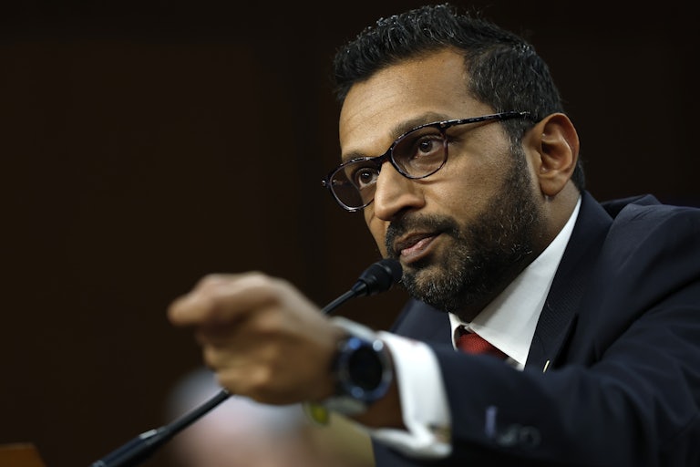 Kash Patel gestures while speaking during his Senate confirmation hearing for FBI director