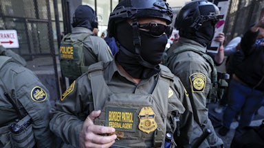 Masked Border Patrol agent