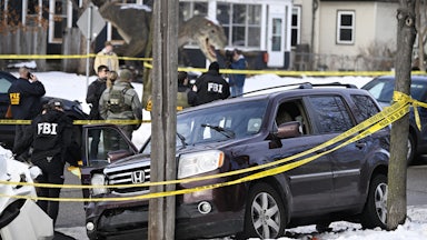 a car crashed into a telephone pole after ICE officers murdered its driver