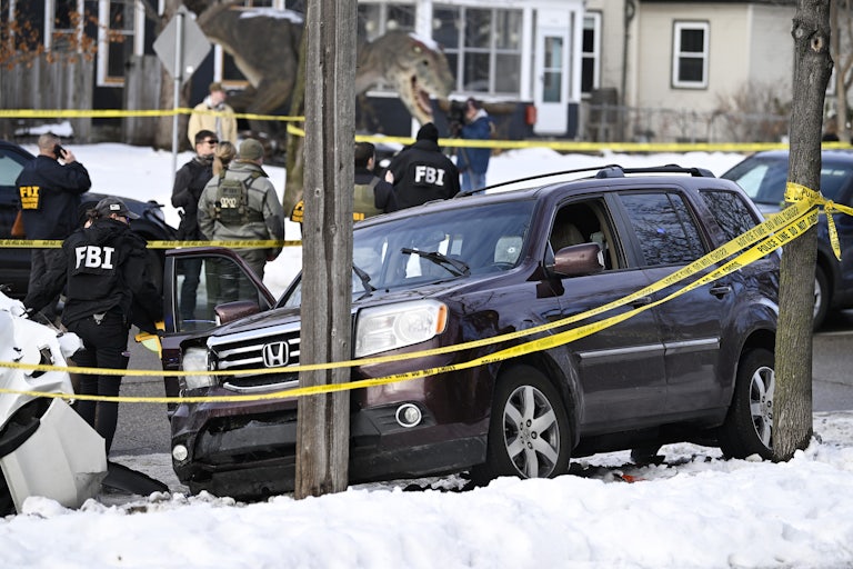 a car crashed into a telephone pole after ICE officers murdered its driver