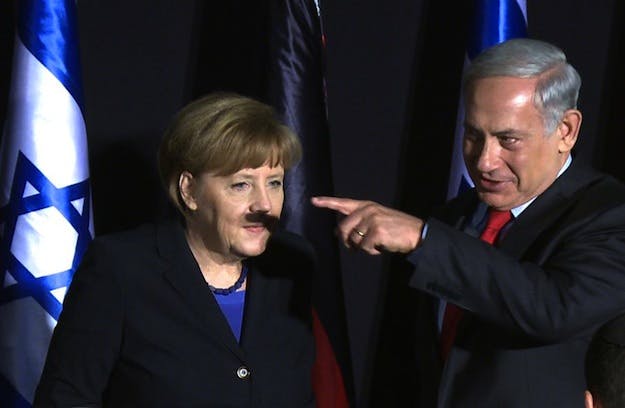 Bibi Netanyahu Gives Angela Merkel a Hitler Moustache | The New Republic