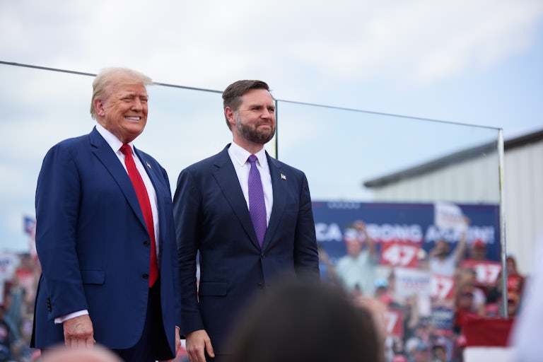 Donald Trump and JD Vance onstage at a campaign rally