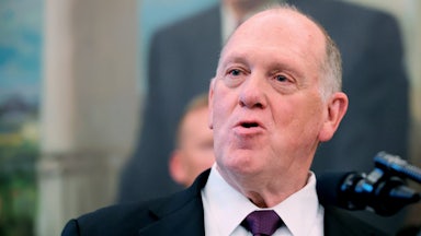 Tom Homan speaks while standing in the Oval Office