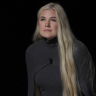 Erika Kirk walks onstage at a TPUSA event