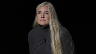 Erika Kirk walks onstage at a TPUSA event