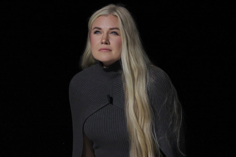 Erika Kirk walks onstage at a TPUSA event