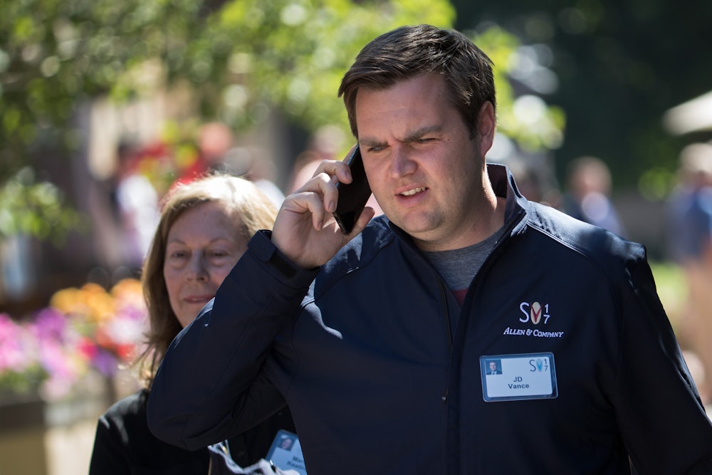 JD Vance talks on his mobile phone during the second day of the annual Allen & Company Sun Valley Conference.