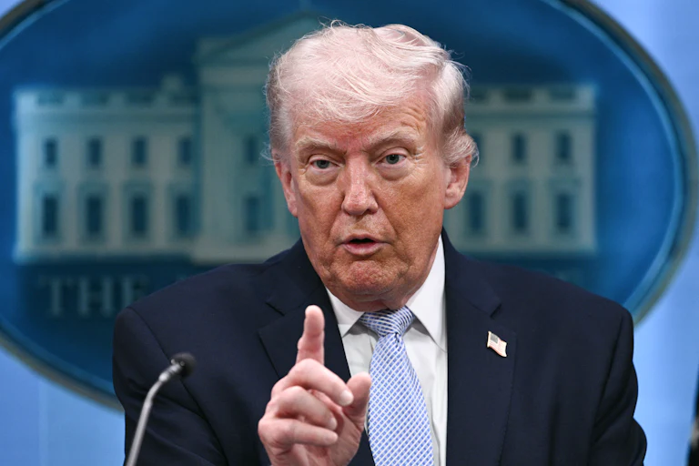 Donald Trump points as he speaks